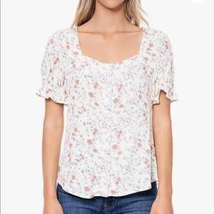 Women’s ruffled short sleeve blouse